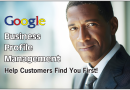 African-American businessman dressed in a grey suit looking at the camera with a blurred background